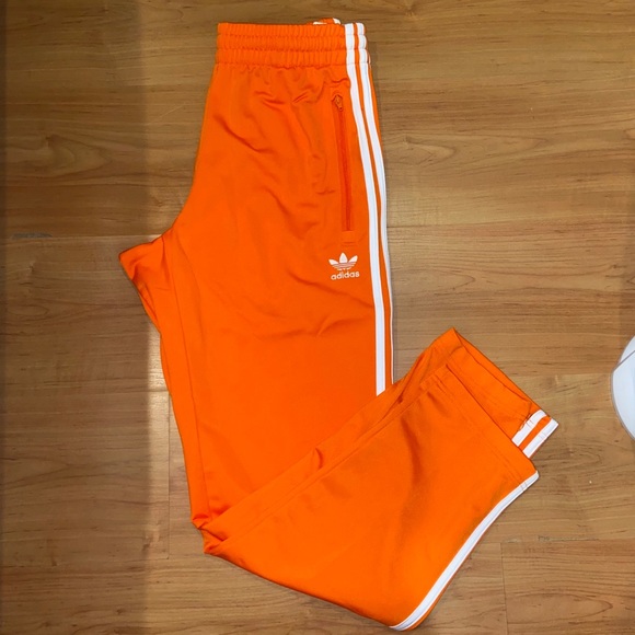 orange adidas sweatpants